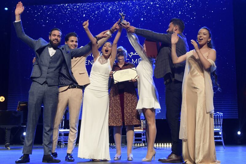 The cast of the Tunisian film, 'Under the Fig Trees', directed by Erige Sehiri, receive the Tanit d’Argent award during the closing ceremony of Carthage Film Festival. AFP