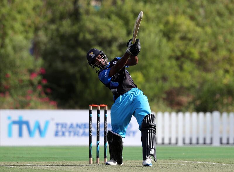 Dubai, United Arab Emirates - Reporter: N/A. Sport. Cricket. ECB Blues' Vriitya Aravind hits a six during the match between the ECB Blues and Dubai in the Emirates D10. Friday, July 24th, 2020. Dubai. Chris Whiteoak / The National
