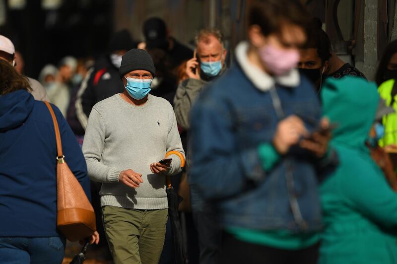 People wait in line at a Covid-19 testing centre in Melbourne, Australia. Victoria's health department had reported 10 new cases in the previous 24 hours.  EPA