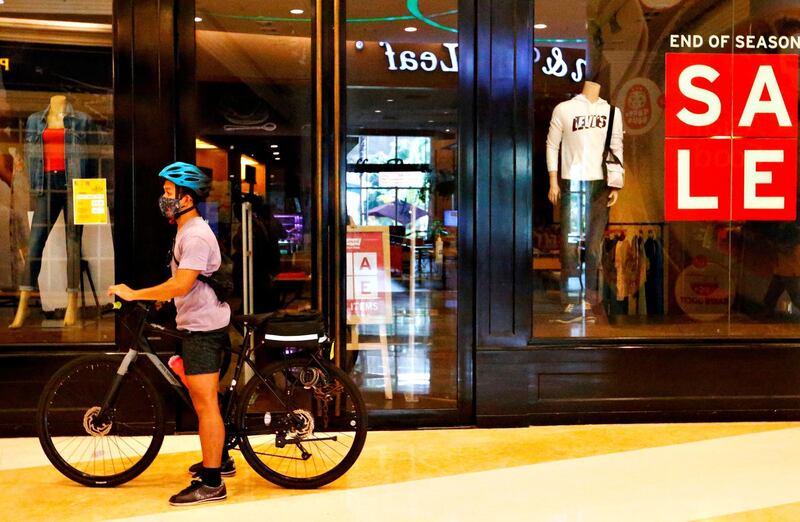 A man rides a bicycle in a shopping mall in Jakarta, Indonesia. Reuters