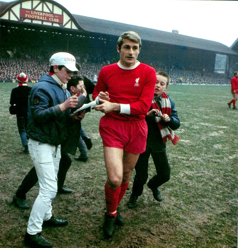 Roger Hunts signs autographs for fans at Anfield in 1969. AFP