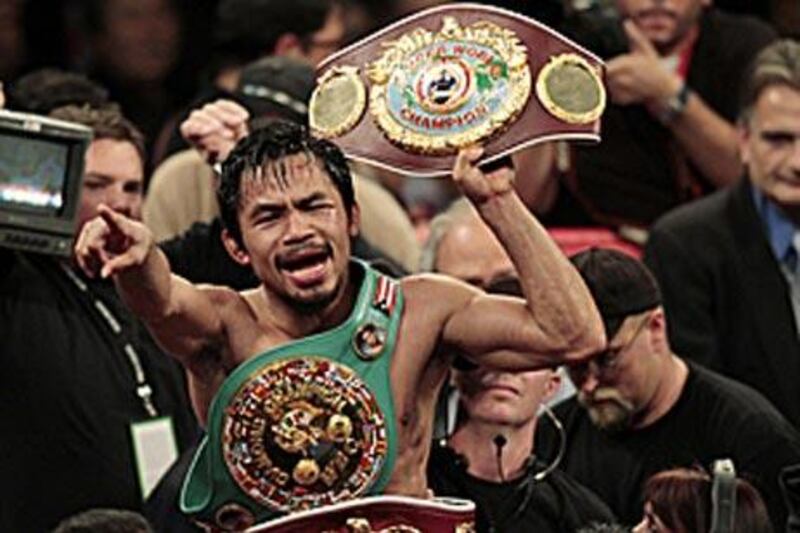 Manny Pacquiao cemented his place as the world's best pound-for-pound boxer after demolishing Miguel Cotto to become the World Boxing Organization welterweight champion.