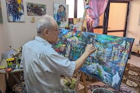 Two decades since Iraq invasion, a resident of battle-scarred city finds refuge in art