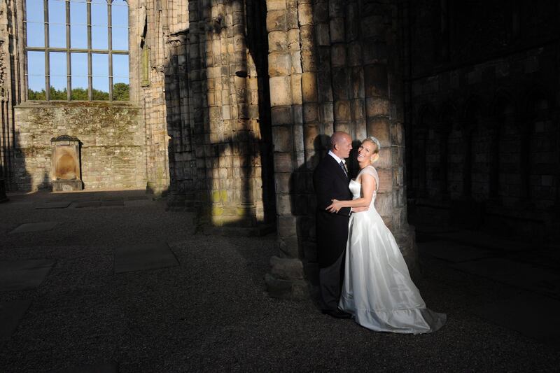 epa02849116 epa02849109 This photograph is provided to you on the understanding that you will make no charge for the supply or distribution of it.
Handout photo of Zara Phillips and Mike Tindall in Holyrood Abbey, Palace of Holyroodhouse, Edinburgh, Scotland, Britain, 30 July 2011 on the occasion of their marriage. The daughter of Britain's Princess Anne and the English rugby player got engaged on 20 December 2010.  EPA/Zara Phillips and Mike Tindall / HO **UK and Republic of Ireland Out** HANDOUT EDITORIAL USE ONLY/NO SALES  EPA/Zara Phillips and Mike Tindall / HO **UK and Republic of Ireland Out** HANDOUT EDITORIAL USE ONLY/NO SALES HANDOUT EDITORIAL USE ONLY/NO SALES *** Local Caption ***  02849116.jpg