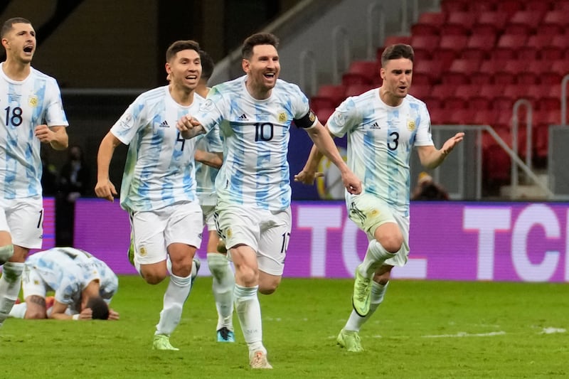 Lionel Messi and teammates celebrate after Argentina defeat Colombia in a penalty shootout in the Copa America semi-finals.