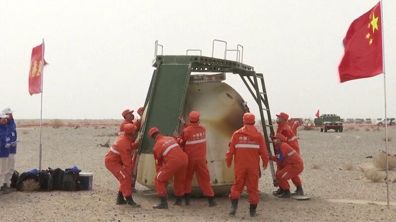 The capsule and the three Chinese astronauts it was carrying safely land. AFP