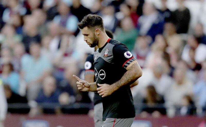 Southampton’s Charlie Austin celebrates scoring his side’s first goal against West Ham. Matt Dunham / AP Photo