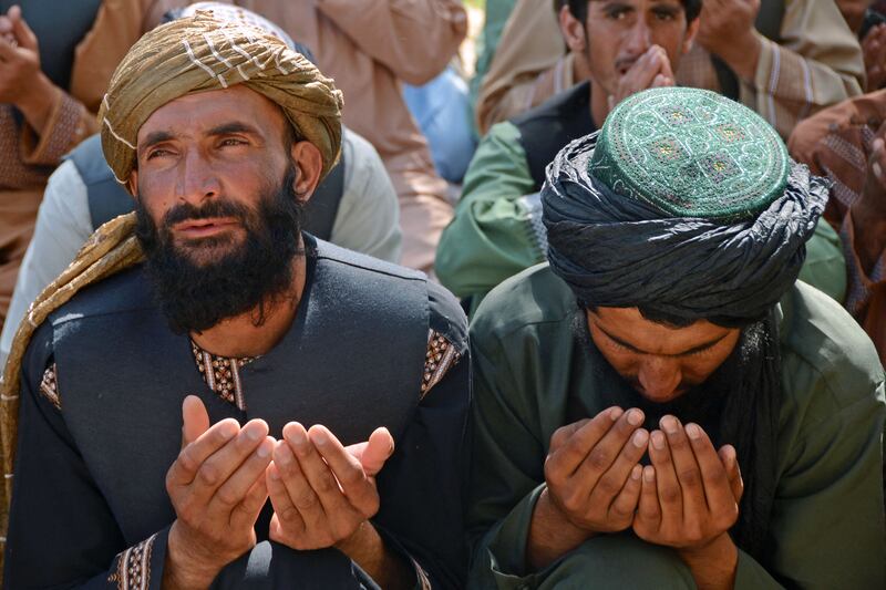 Worshippers offer Eid Al Fitr prayers in Kandahar. AFP