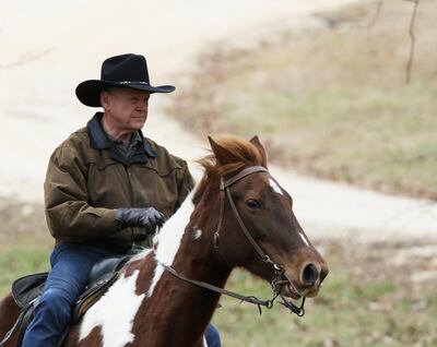 epa06385292 Republican Alabama Senate candidate Roy Moore arrives on horseback to vote in Gallant, Alabama, USA, 12 December 2017.  Citizens of Alabama will vote to decide whether Republican Roy Moore or Democrat Doug Jones will hold a Senate seat in the Federal government.  EPA/DAN ANDERSON