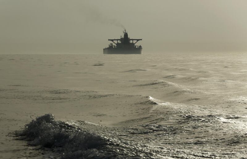 The impounded Iranian crude oil tanker, Grace 1, is silhouetted as it sits anchored off the coast of Gibraltar on Saturday, July 20, 2019. Tensions have flared in the Strait of Hormuz in recent weeks as Iran resists U.S. sanctions that are crippling its oil exports and lashes out after the seizure on July 4 of one of its ships near Gibraltar. Photographer: Marcelo del Pozo/Bloomberg