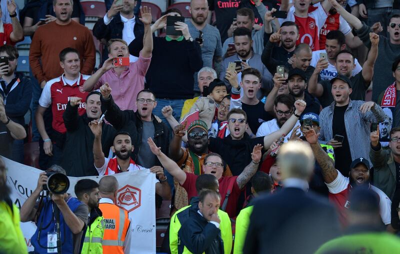 Soccer Football - Premier League - Huddersfield Town vs Arsenal - John Smith's Stadium, Huddersfield, Britain - May 13, 2018   Arsenal manager Arsene Wenger acknowledges fans after the match   REUTERS/Peter Powell    EDITORIAL USE ONLY. No use with unauthorized audio, video, data, fixture lists, club/league logos or "live" services. Online in-match use limited to 75 images, no video emulation. No use in betting, games or single club/league/player publications.  Please contact your account representative for further details.