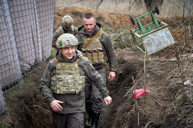 Ukraine's President Volodymyr Zelensky on a tour to the eastern Ukrainian conflict zone. Concerns are growing that the long-simmering conflict there could erupt into a widespread fighting. AP
