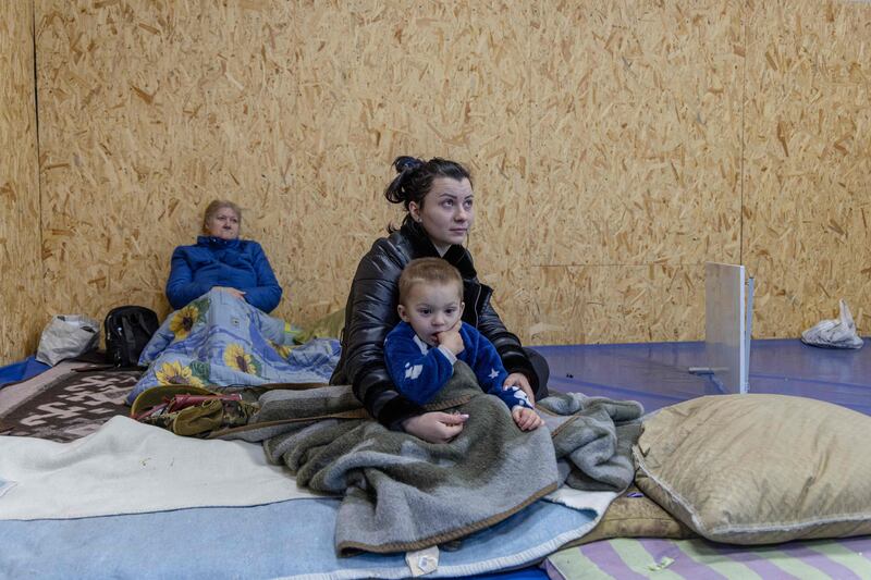 Civilians take shelter in a gym after their apartments were damaged in a drone attack in Odesa. AFP