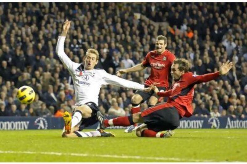 Blackburn’s Gael Givet, right, would be ruing an error he made against Tottenham Hotspur in their 4-2 defeat.