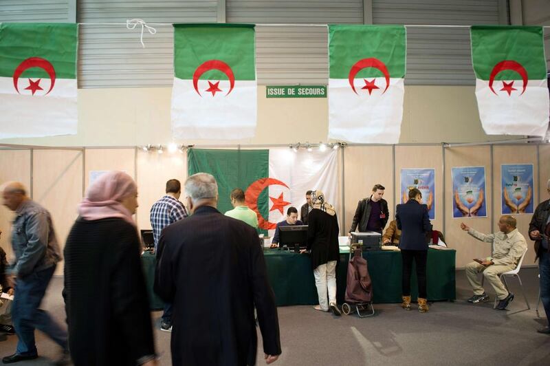 Algerians prepare to vote at a polling station in the Chanot Park on April 12 in Marseille, southern France. Algeria's Abdelaziz Bouteflika, who is running for a fourth term in Thursday's presidential vote, is widely expected to win despite his frail health preventing him from even campaigning. Bertand Langlois / AFP Photo

