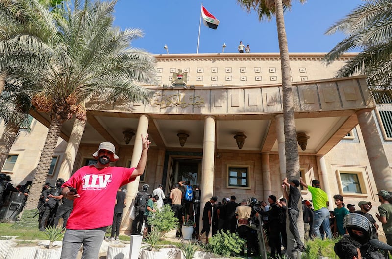 Supporters of the powerful cleric stormed the Republican Palace, a ceremonial building in the fortified Green Zone, a security source said.  AFP

