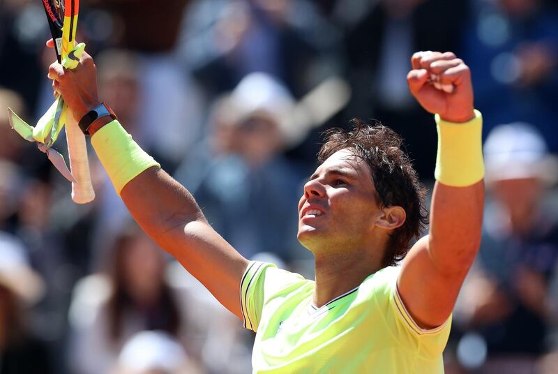 Rafael Nadal reacts after winning against Roger Federer in their French Open semi-final. EPA