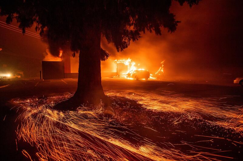Flames consume a Kentucky Fried Chicken as the Camp Fire tears through Paradise, California. AP Photo