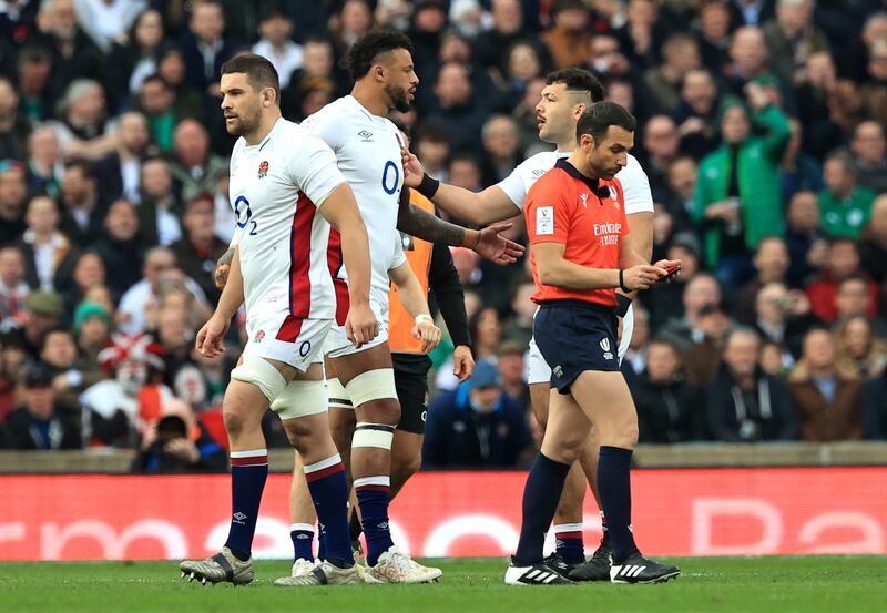 England's Charlie Ewels leaves the field after being shown a red card by referee Mathieu Raynal against Ireland at Twickenham. Getty
