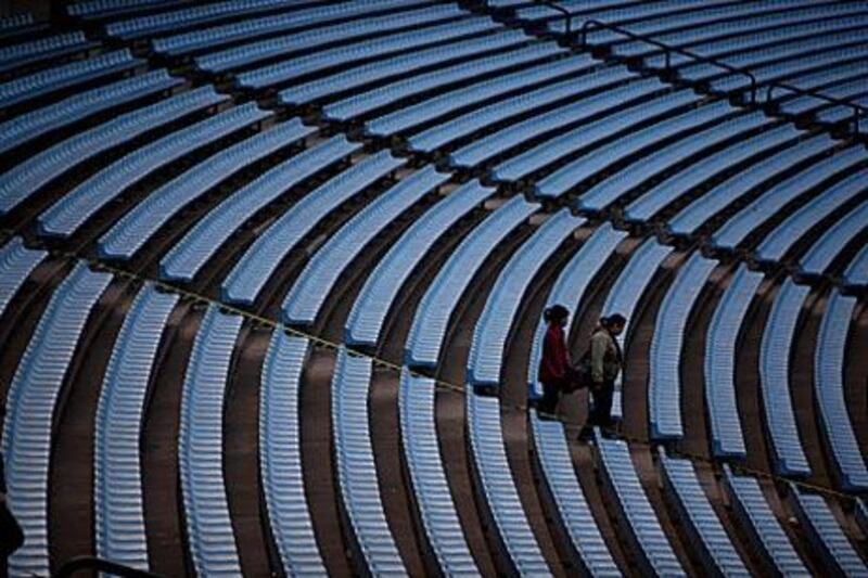 Tourists visit the an empty Bombonera in Buenos Aires, home to Boca Juniors, on Thursday.