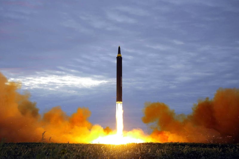 FILE - This Aug. 29, 2017 file photo distributed on Aug. 30, 2017, by the North Korean government shows what was said to be the test launch of a Hwasong-12 intermediate range missile in Pyongyang, North Korea. 
Japan is debating whether to develop limited pre-emptive strike capability and buy cruise missiles - ideas that were anathema in the pacifist country before the North Korea missile threat.  North Korea��������s test-firing of a missile on Aug. 29, 2017, which flew over Japan and landed in the northern Pacific Ocean, quickly reactivated the debate at parliament and in the media. (Korean Central News Agency/Korea News Service via AP, File)