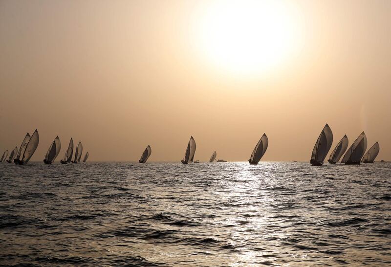 Sailors participate in the annual long-distance dhow sailing race, known as Al Gaffal, near Sir Abu Nair island towards Dubai.  AFP