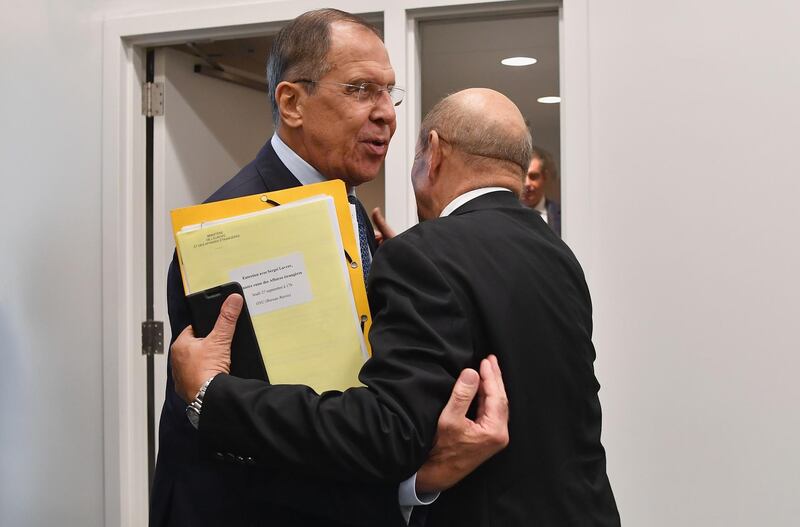 France's Foreign Minister Jean-Yves Le Drian (R) meets with Russia's Foreign Minister  Sergei Lavrov during a bilateral meeting on the sidelines of the UN General Assembly.  AFP