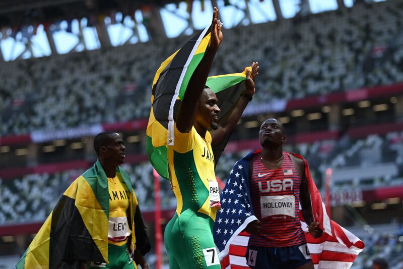 Gold medallist Hansle Parchment of Jamiaca.