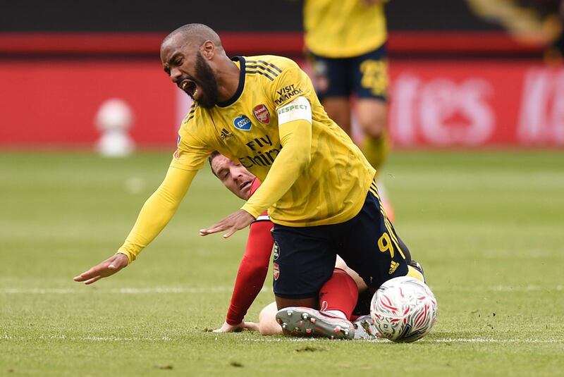 Alexandre Lacazette - 7: Was unfortunate to be off the field receiving treatment when Pepe converted a penalty the Frenchman had won. Linked well with his two wide forwards before being replaced in the second half. Reuters