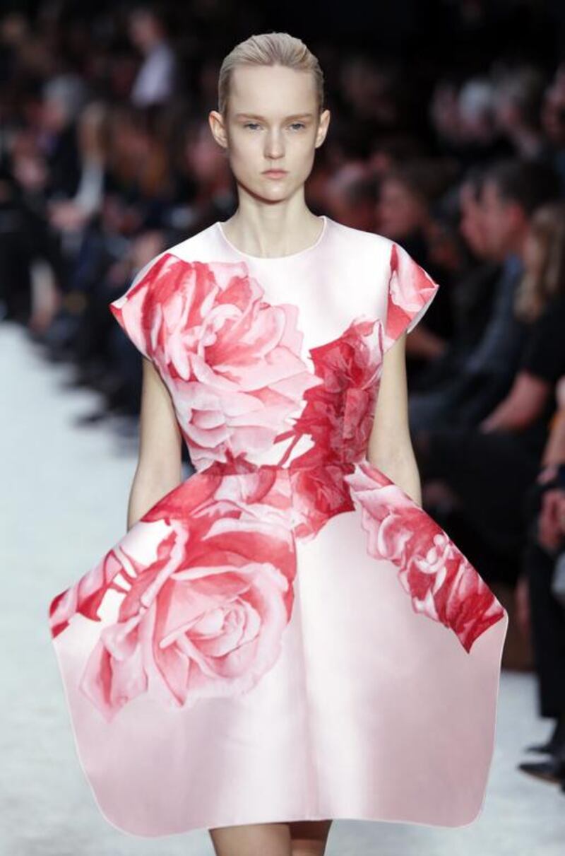 Giambattista Valli took his usual exquisite prettiness and pepped it up with monochrome animal patterns that appeared felted into the thick ­mohairs and wool, followed by mixes of scarlet, burgundy and the most delicate pink silks printed with giant roses. Jacques Brinon / AP photo