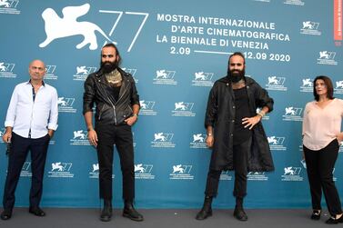 Actor Salim Daw, Palestinian filmmaking brothers Tarzan and Arab Nasser and actress Hiam Abbas pose at a photocall for 'Gaza Mon Amour' at the 77th annual Venice International Film Festival, in Venice, Italy. EPA 
