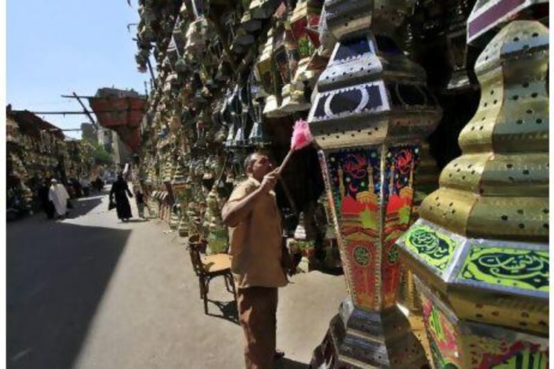 Fewer than a dozen fanoos makers remain in Cairo because of cheaper imports. Khalil Hamra / AP Photo