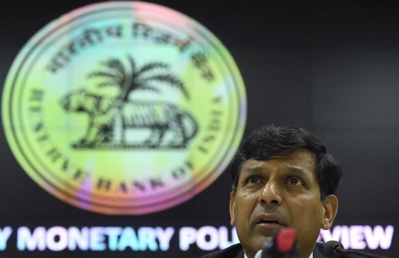 Reserve Bank of India governor Raghuram Rajan announcing interest rate cuts in Mumbai on Tuesday. Punit Paranjpe / AFP