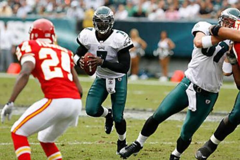 Michael Vick, in action for the Philadelphia Eagles last season against the Kansas City Chiefs, is facing being released by the Eagles after being linked with a shooting incident.