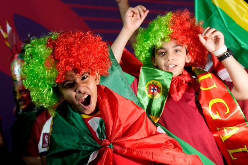 Young fans are ready to roar on Portugal and Ghana at Stadium 974. AP 