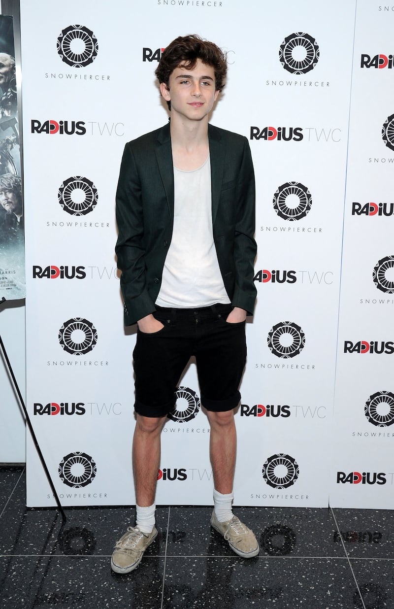The actor is clad in denim shorts and a black blazer at the 'Snowpiercer' premiere in New York, in June 2014. AFP