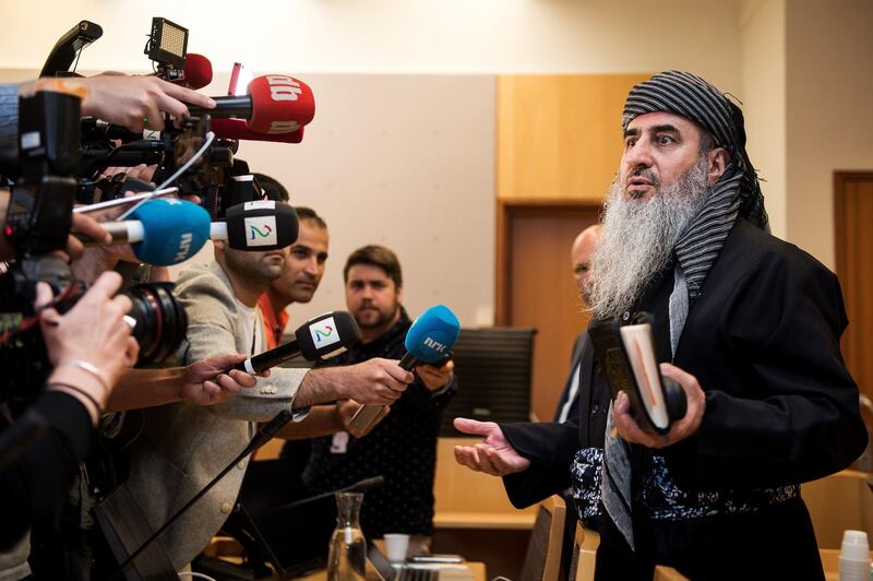 Controversial Norway-based Iraqi Kurdish fundamentalist preacher Mullah Krekar talks to the press during a hearing after he was convicted in Italy of "terrorist" conspiracy, on July 17, 2019 in Oslo, Norway. (Photo by Carina Johansen / NTB Scanpix / AFP) / Norway OUT