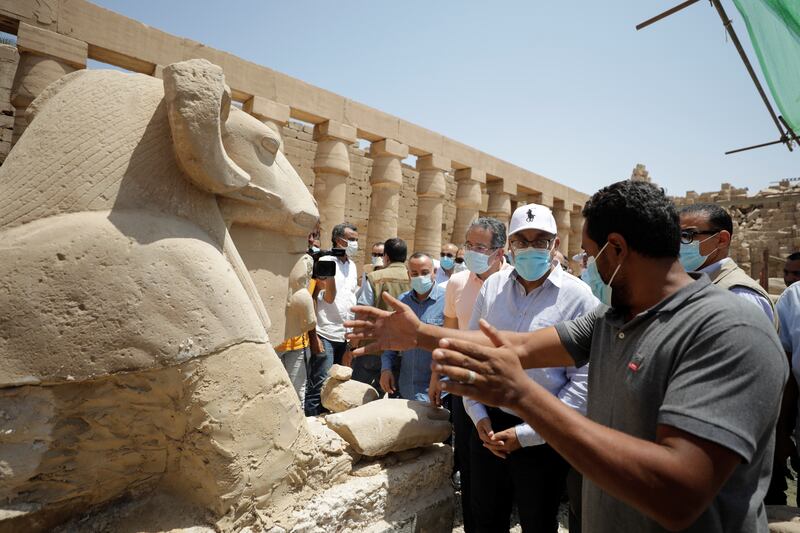 Egyptian Prime Minister Mostafa Madbouly is given a tour of Karnak Temple. Reuters