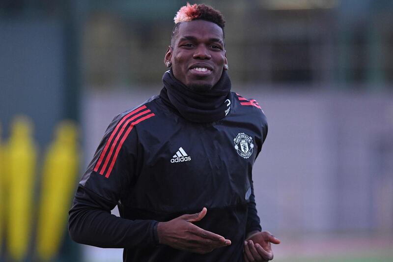 Manchester United's French midfielder Paul Pogba attends a team training session at the club's training complex near Carrington, west of Manchester in north west England on December 4, 2017, on the eve of their UEFA Champions League Group A football match against CSKA Moscow. / AFP PHOTO / Paul ELLIS
