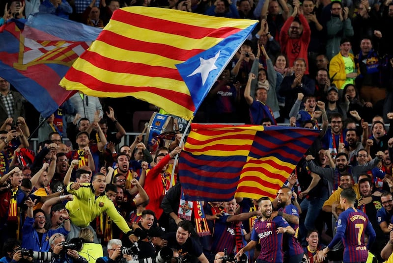 Jordi Alba celebrates scoring Barcelona's second goal in front of fans at Camp Nou. Reuters