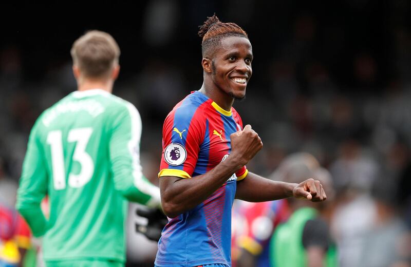 Soccer Football - Premier League - Fulham v Crystal Palace - Craven Cottage, London, Britain - August 11, 2018   Crystal Palace's Wilfried Zaha celebrates after the match   Action Images via Reuters/John Sibley    EDITORIAL USE ONLY. No use with unauthorized audio, video, data, fixture lists, club/league logos or "live" services. Online in-match use limited to 75 images, no video emulation. No use in betting, games or single club/league/player publications.  Please contact your account representative for further details.