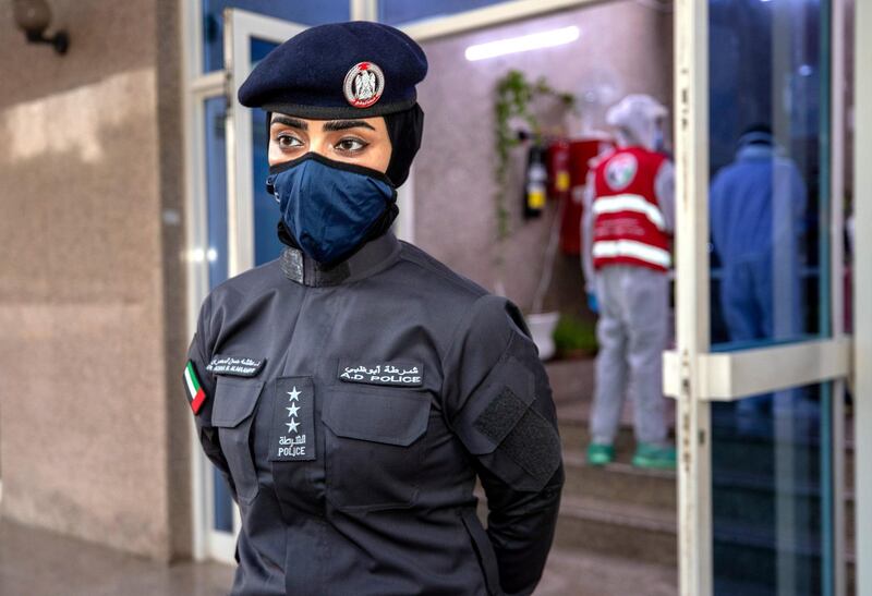 Abu Dhabi, United Arab Emirates, June 22, 2020.   
STORY BRIEF: Police patrols knocking on doors offering free Covid-19 tests to residents in buildings in AD downtown, Al Bakra Street area.
--  Captain Ayesha Al Mersad of the AUH Police.
Victor Besa  / The National
Section:  NA
Reporter:  Haneen Dajani