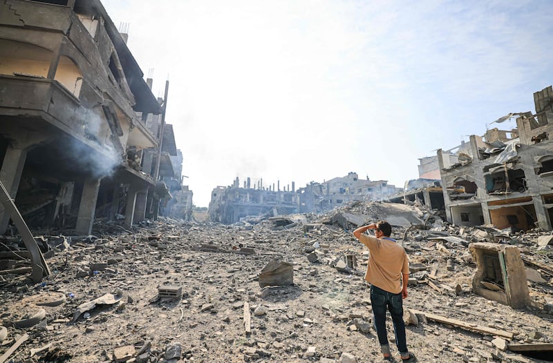 A man looks at the destruction in the ravaged Jabalia refugee camp, following overnight Israeli air strikes. AFP