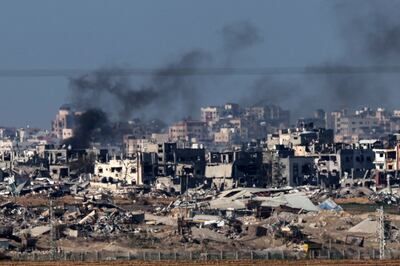 A picture taken from southern Israel shows smoke billowing over the Gaza Strip during Israeli bombardment. AFP