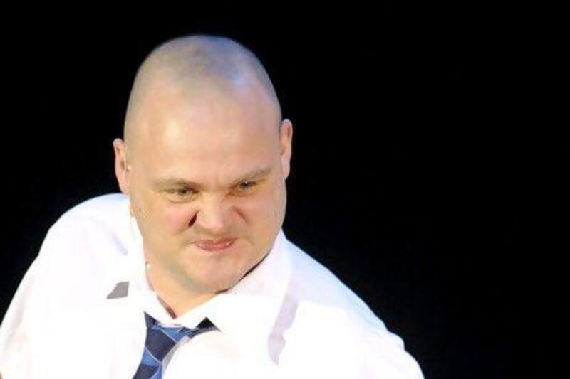The comedian Al Murray performs on stage. Courtesy EMPICS Entertainment