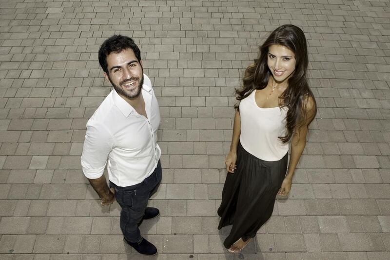 Models Sajjad Delafrooz, left, an Iranian, and Graciela Pischner, a Brazilian, are two of the country’s most recognisable faces after appearing in advertising campaigns all over the UAE. Jaime Puebla / The National