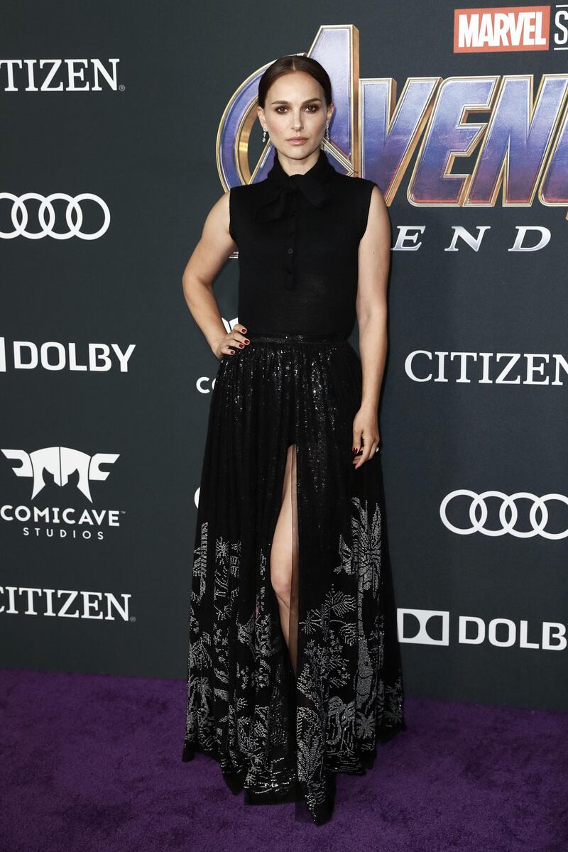 epa07522152 Israeli-American actress Natalie Portman poses for photographers upon her arrival for the premiere of 'Avengers: Endgame' at the LA Convention Center in Los Angeles, California, USA, 22 April 2019. Black tie-neck sleeveless blouse and embroidered skirt by Christian Dior. 'Avengers: Endgame' will be released US theaters on 26 April.  EPA-EFE/ETIENNE LAURENT