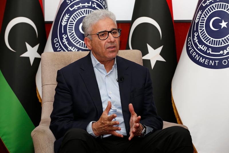 Disputed Libyan Prime Minister Fathi Bashagha said he has no immediate plans to return to Tripoli and attempt to rule the country from there. AP