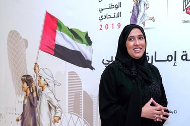 Ameena Al Mazrouei registers to enter the FNC elections at the office of Abu Dhabi Chamber of Commerce & Industry. Victor Besa / The National 