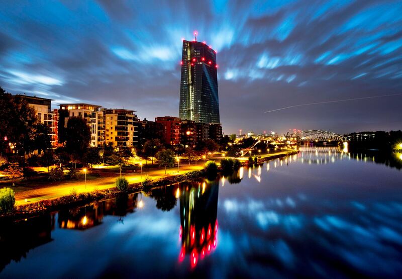 Clouds pass over the European Central Bank building in Frankfurt, Germany.  AP